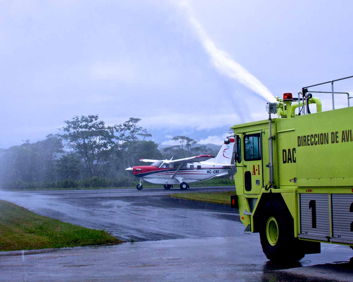 MAF's Kodiak being doused by a fire truck in Ecuador to celebrate it's arrival 